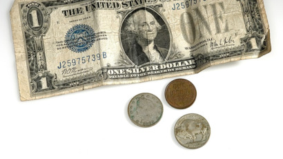 Dollar_bill_and_small_change.jpg