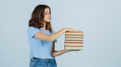 young-lady-holding-books.jpg